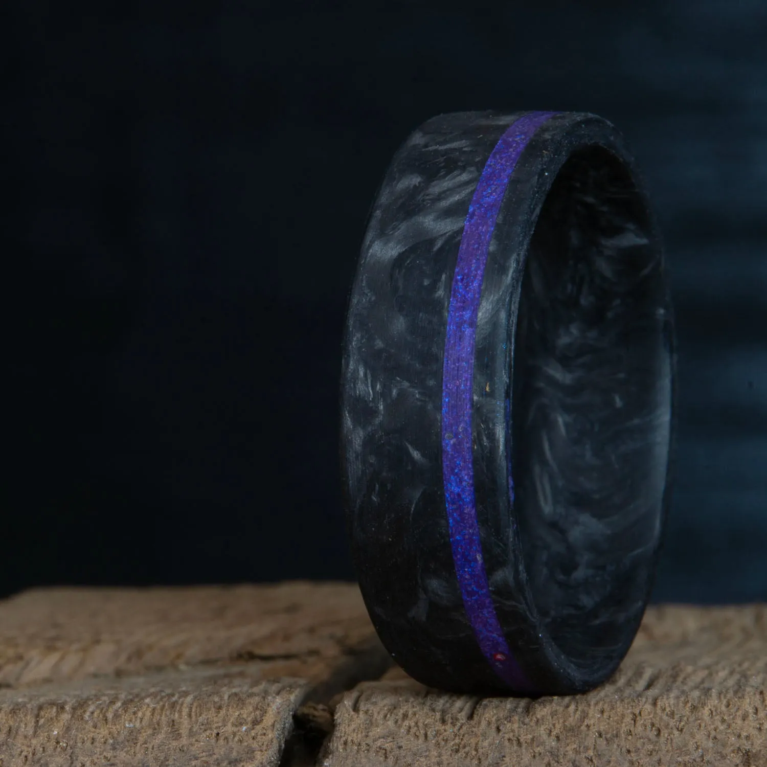 Forged carbon fiber ring with purple inlay